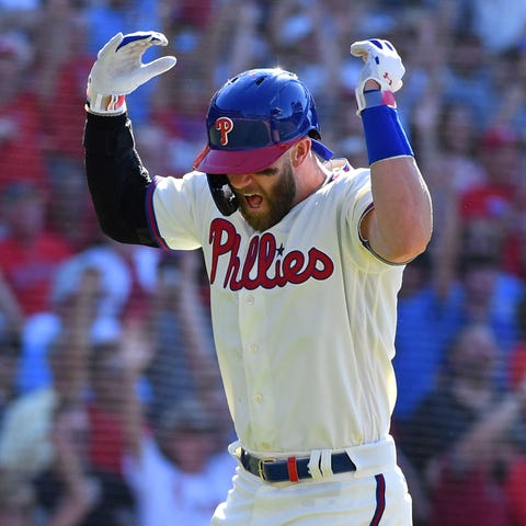 Bryce Harper celebrates a home run against the Ang