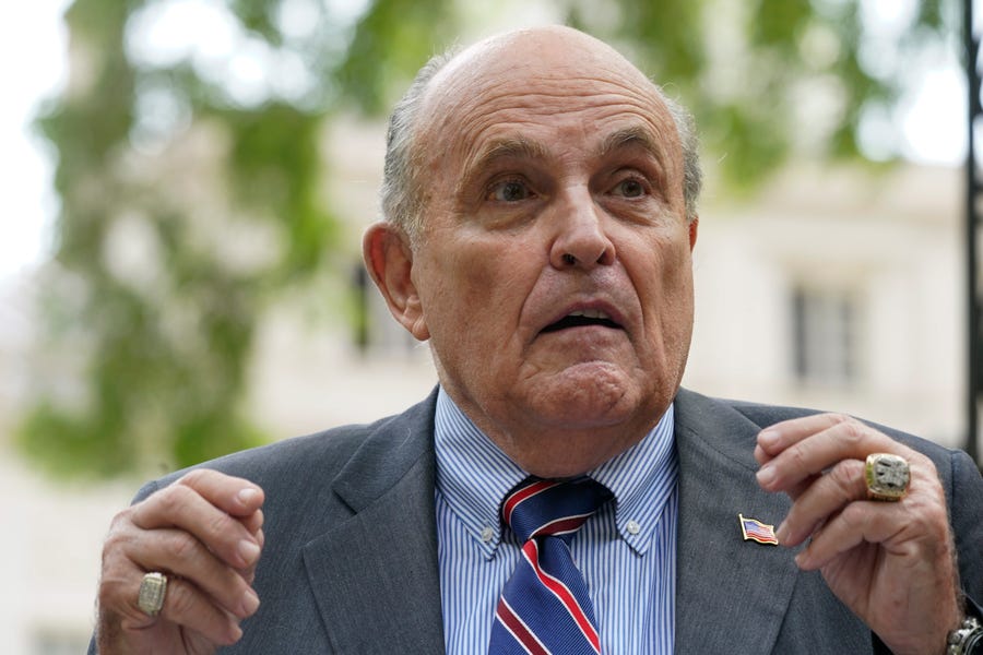 FILE - Former New York City mayor Rudy Giuliani speaks during a news conference on  June 7, 2022, in New York. Giuliani's lawyer says prosecutors in Atlanta have said Giuliani is a target of their criminal investigation into possible illegal attempts by then-President Donald Trump and others to interfere in the 2020 general election in Georgia. (AP Photo/Mary Altaffer, File) ORG XMIT: WX111