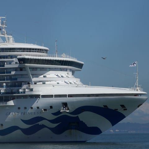 The Grand Princess cruise ship approaches Pier 35 