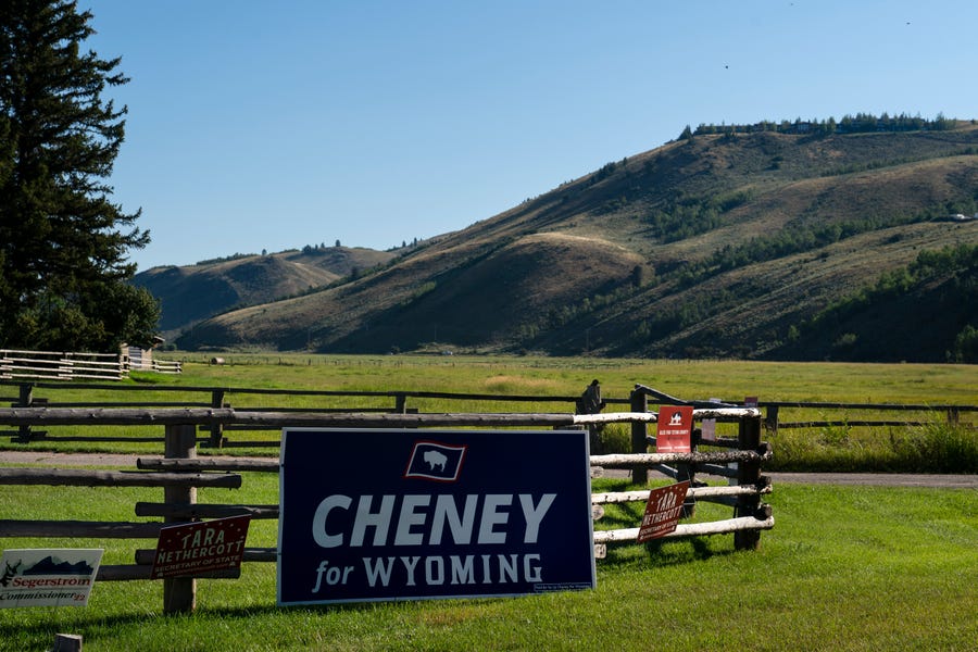 A campaign sign supporting Rep. Liz Cheney is posted outside the Mead Ranch in Jackson, Wyo., Monday, Aug. 15, 2022.