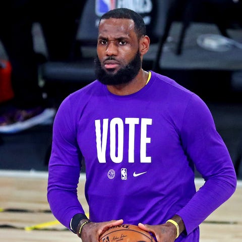 LeBron James wears a "Vote" shirt in October 2020.