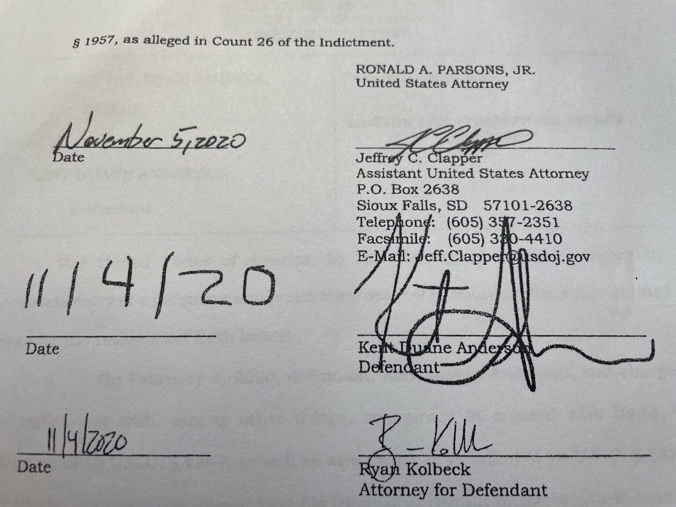 Kent Duane of South Dakota used unusual handwriting when signing his guilty plea to wire fraud and money laundering resulting from an organic grain fraud scheme