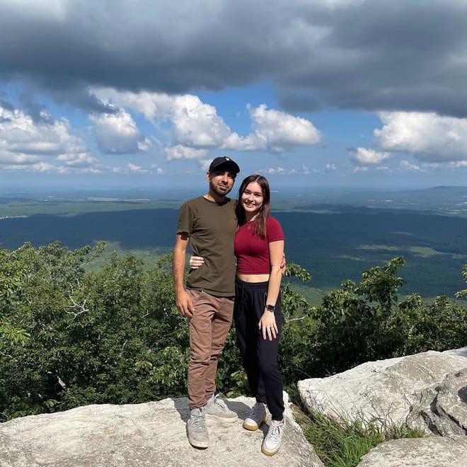 Adam Simjee and Mikayla Paulus were visiting the Talladega National Forest Sunday when they were robbed; Simjee was shot and died from his injuries.