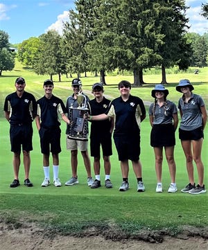 The River View golf team holds the trophy after winning the Coshocton Cup on Wednesday at Hickory Flats.