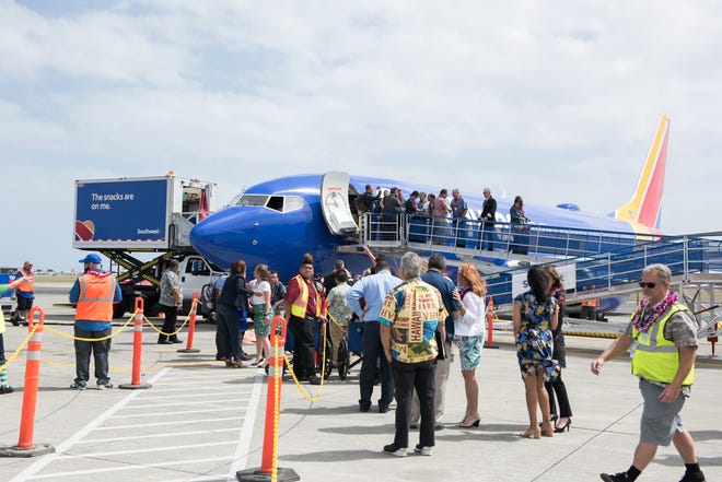 Honolulu, Hawaii - Southwest Airlines inaugural Hawaii flight arrives at Daniele K. Inouye International Airport in Honolulu in March 2019.  (Via OlyDrop)