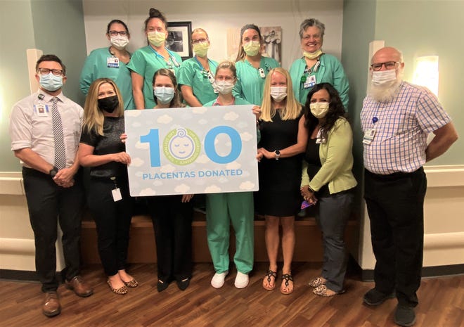 Adena Labor and Delivery caregivers and Lifeline of Ohio representatives celebrate Adena Health System’s 100th placenta donation milestone.