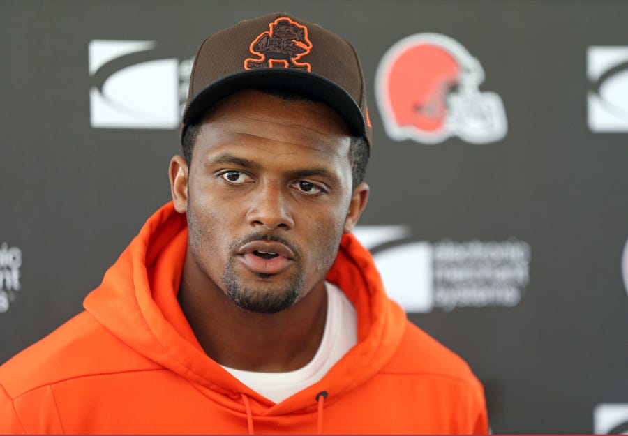 Cleveland Browns quarterback Deshaun Watson speaks to the media, Thursday, Aug. 18, 2022, in Berea, Ohio, after the team announced that Watson has reached a settlement with the NFL and will serve an 11-game unpaid suspension and pay a $5 million fine rather than risk missing his first season as quarterback of the Cleveland Browns following accusations of sexual misconduct while he played for the Houston Texans.