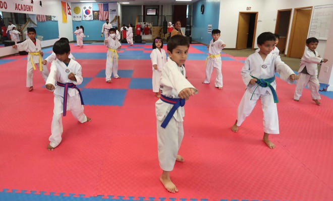 Sunshine Taekwondo Academy in Akron has many students who are refugees from Nepal.