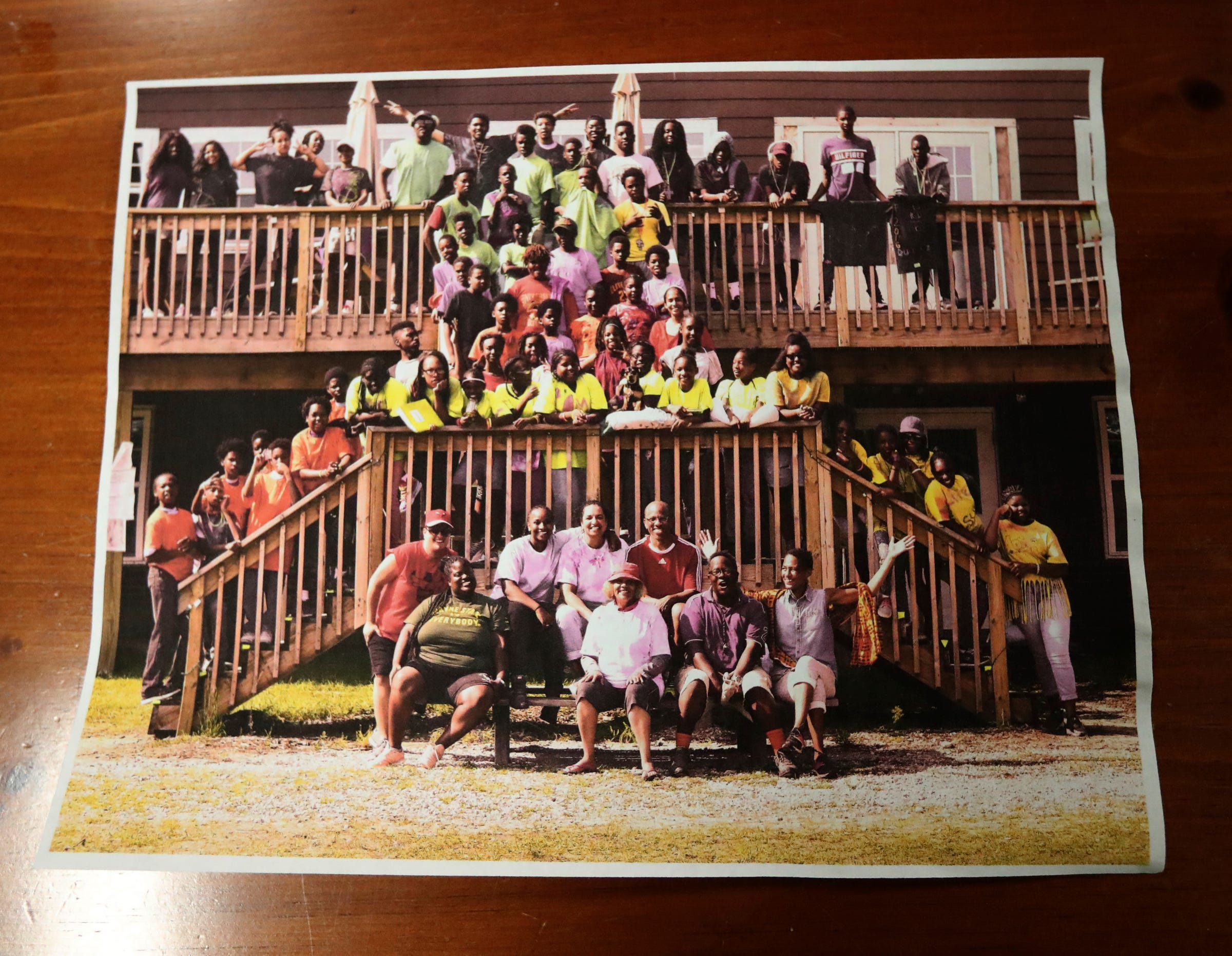 A copy of a picture taken at a tennis camp on August 18, 2022.  Collins is using teaching tennis as a way to celebrate his late wife of 36 years Lois Collins.