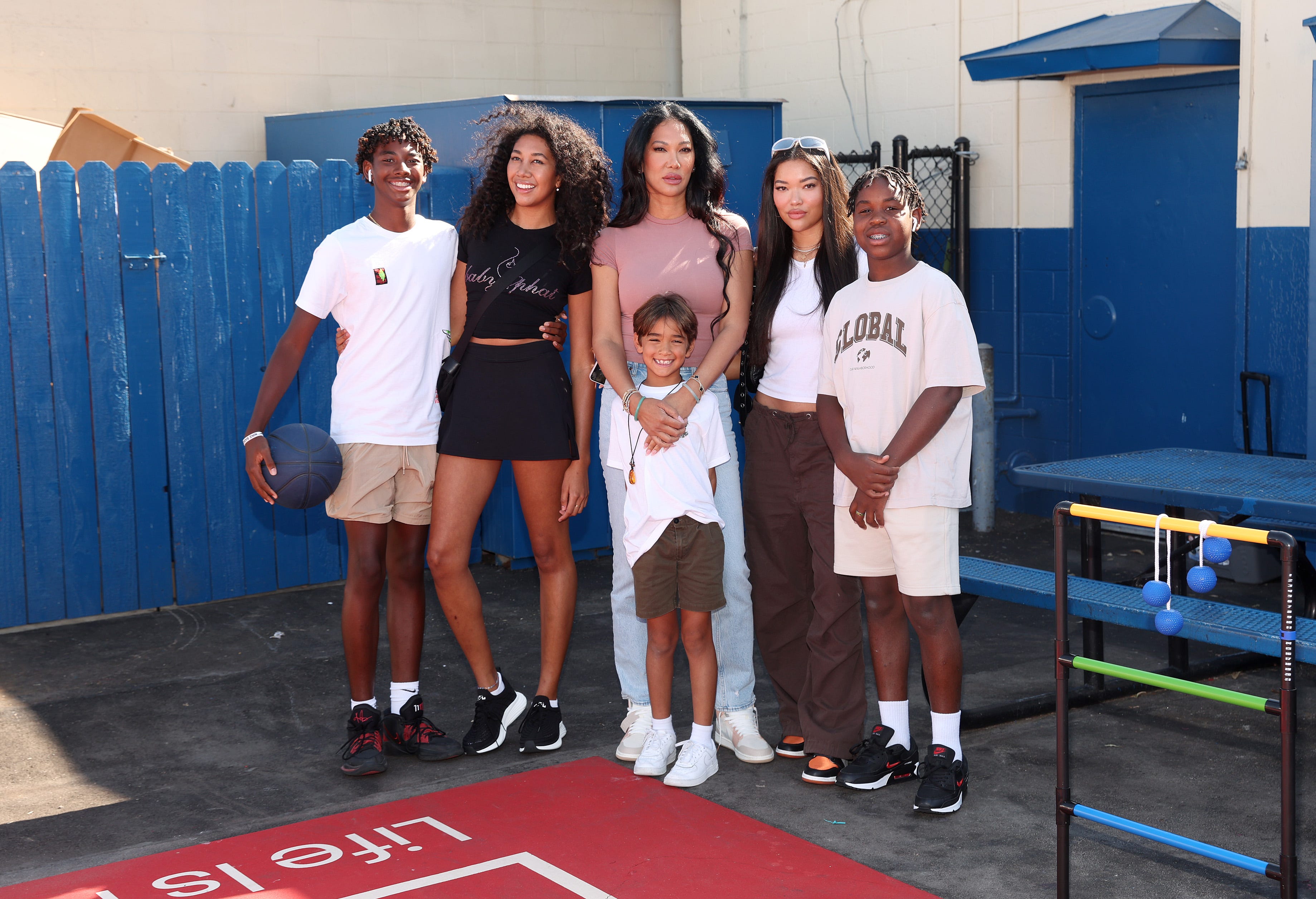 Kimora Lee Simmons poses with her children in rare photo