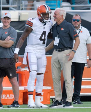 Browns owner Jimmy Haslam talks with quarterback Deshaun Watson before the team's preseason game last week.