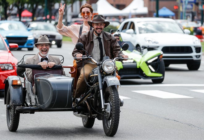 Classic and modern vehicles cruise on Woodward Avenue in Birmingham during the annual Woodward Dream Cruise on Saturday, Aug. 20, 2022.