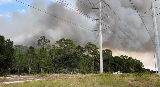 A 57-acre brush fire was contained near Indiantown on Friday, August 19, 2022. No homes were affected.