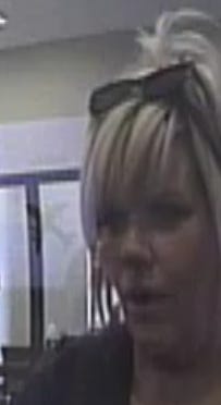 A photo of a female suspect who cashed one of the stolen checks from Ottawa County.