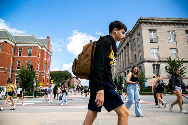 University of Iowa students go to class on the first day of fall semester, Monday, August 22, 2022, in Iowa City, Iowa.