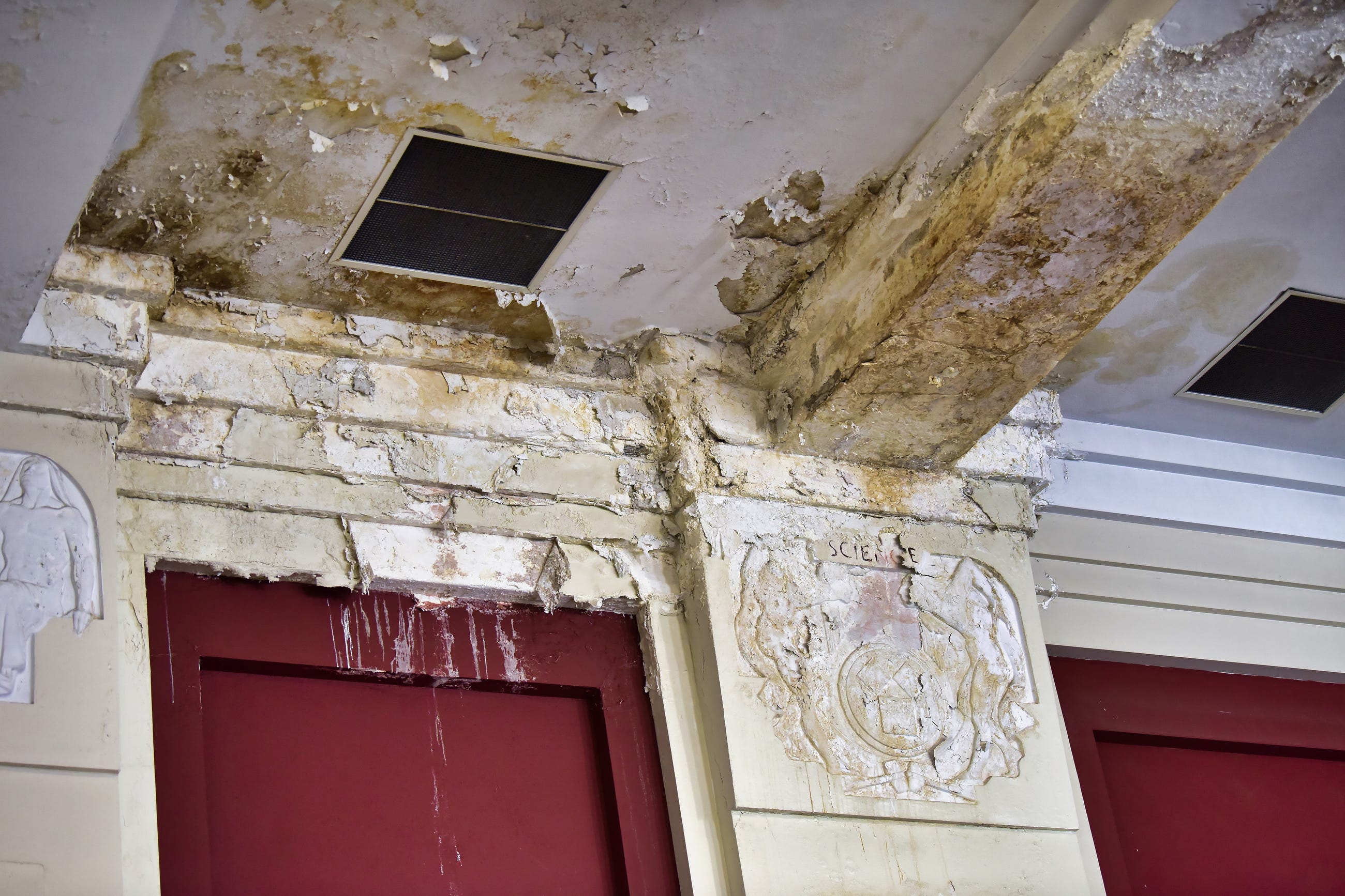Water damage on the ceiling in the auditorium at Paterson's School 5, caused by a persistently leaky roof.