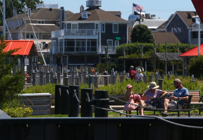 People take advantage of Lewes Canalfront Park. Sunny weather brought crowds to the Delaware beaches, Saturday, August 21, 2022.