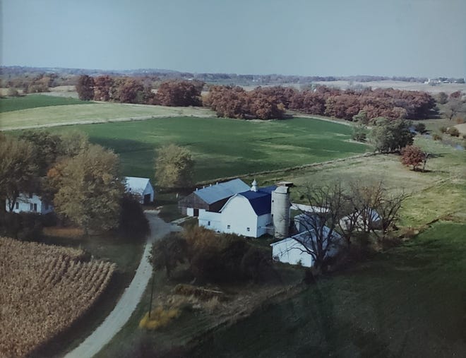 The Oncken farm in its heyday.  The tobacco shed is the gray building just  left of the barn, the oat house to the left between the trees.