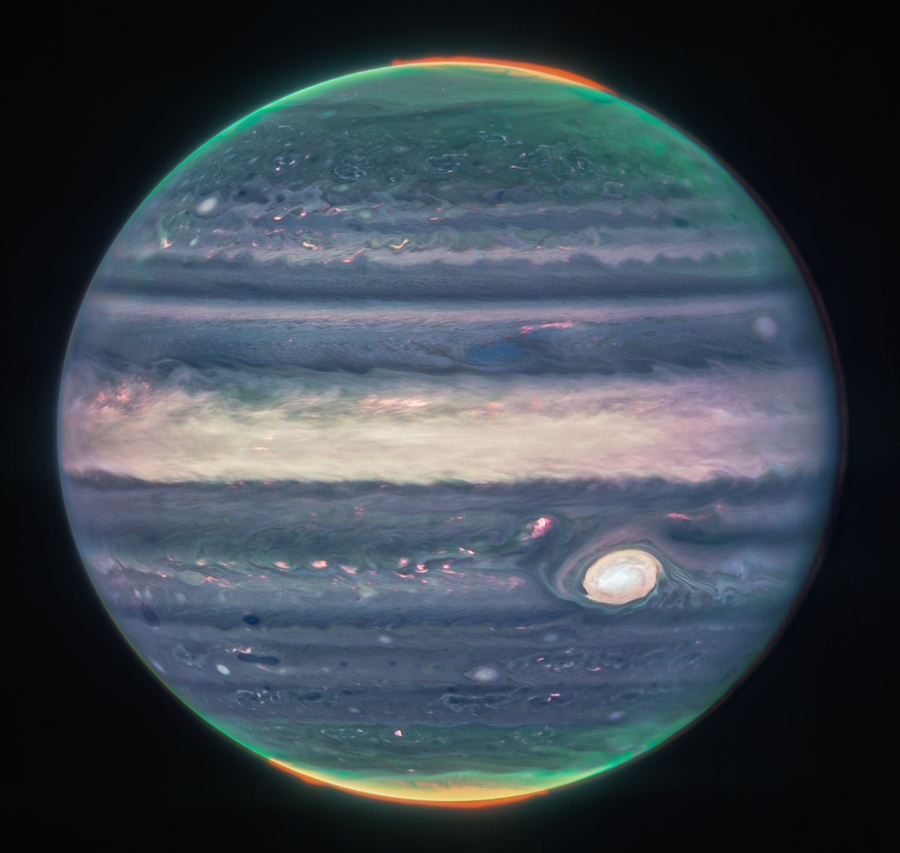 Webb NIRCam composite image of Jupiter from three filters – F360M (red), F212N (yellow-green), and F150W2 (cyan) – and alignment due to the planet's rotation.
