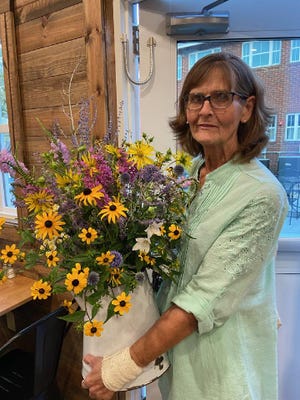 Susan Clime brought this summery bouquet to the August meeting of Earth, Wind and Flowers Garden Club.