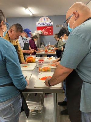 People take part in cooking classes that are part of Sabrosa Vida, a chef-led cooking and nutrition program brought to the community by the El Paso Center for Diabetes, in partnership with the Paso del Norte Health Foundation’s Healthy Living priority area.