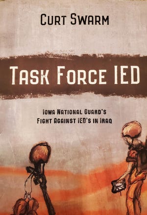 The cover of Curt Swarm's book, "Task Force IED" was designed by Iowa Wesleyan University graduate Steve Helling.