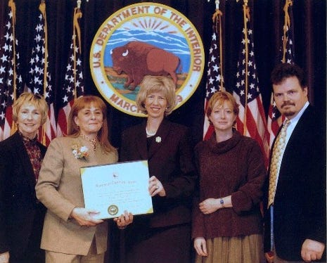Bonnie Carroll, second from the left, received a IIa award from the U.S. Department of the Interior.