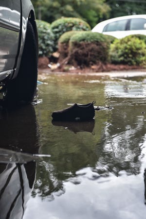 Personal items, including shoes, were left behind during Brandon nursing home's evacuation due to heavy flooding in the region in Brandon, Miss., Wednesday, August 24, 2022.