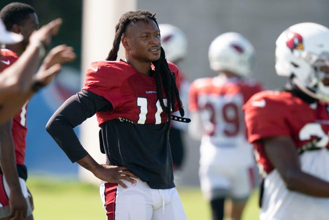 Aug 24, 2022; Nashville, Tennessee; Arizona Cardinals wide receiver DeAndre Hopkins (10) watches his teammates run a drill during a joint training camp practice against the Tennessee Titans at Ascension Saint Thomas Sports Park.