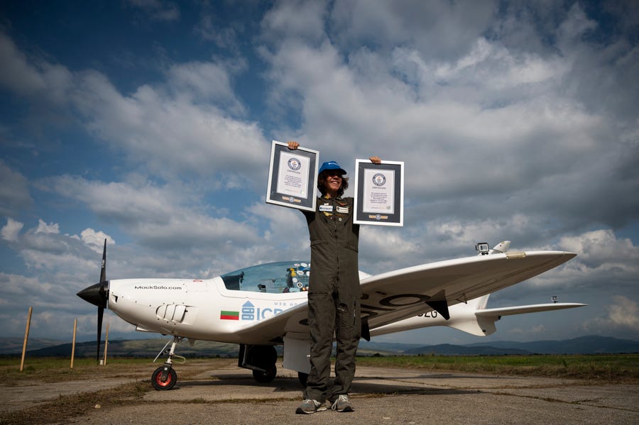 Mark Rutherford, the youngest person to fly solo around the world lands on the runway in Radomir, Bulgaria, and is greeted by his family and fans after completing his flight. The 17-year-old received a Guiness World Record certificate for his achievement.