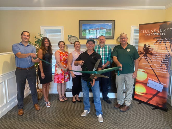 Matt Randall, Agent of Club Seacret, is welcomed as a valued member of the Dover Chamber with a ribbon-cutting ceremony.