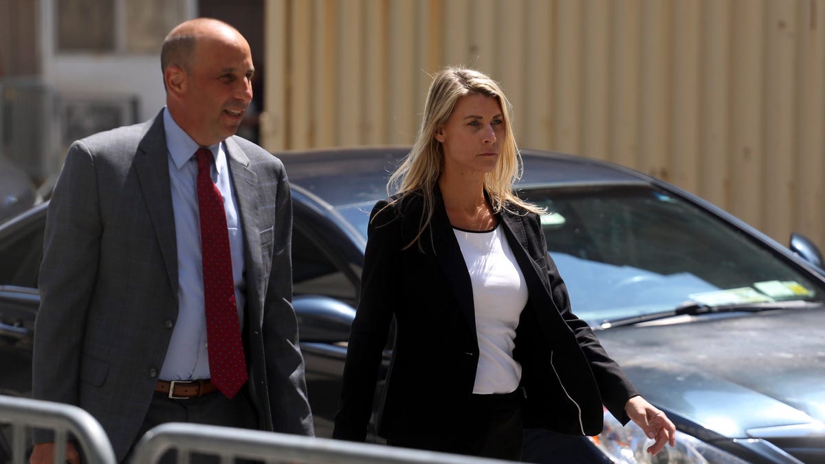 Aimee Harris leaves Federal District Court after pleading guilty to stealing a diary and other belongings of President Joe Biden's daughter, Ashley Biden, and selling them to the conservative group Project Veritas in the final weeks of the 2020 campaign, in Manhattan on Thursday, Aug. 25, 2022. Harris and Robert Kurlander admitted they took part in a conspiracy to transport stolen materials from Florida, where Biden had been living, to New York, where   Project Veritas has its headquarters.