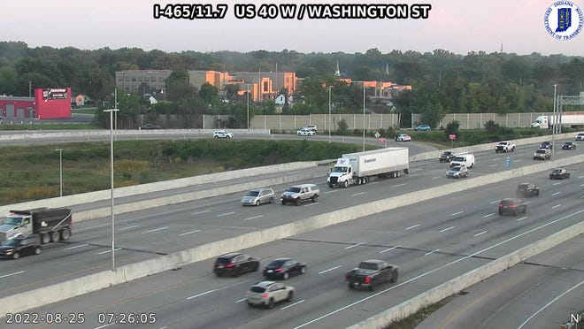 Law enforcement block the entrance ramp at West Washington and I-465 early Aug. 25, 2022 after a fatal crash in the area.