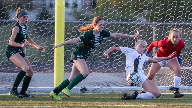 Sacred Heart's Ava Hendrick stops a goal by South Oldham in a showdown of the two top teams in Kentucky. Aug. 24, 2022