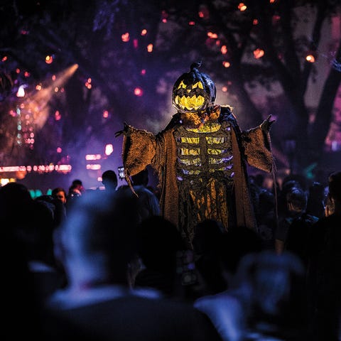 A stilt walker towers above guests at 2019's Hallo