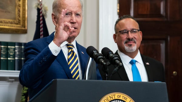 President Joe Biden responds to a question about t