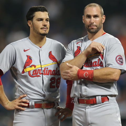 Cardinals third baseman Nolan Arenado and first ba