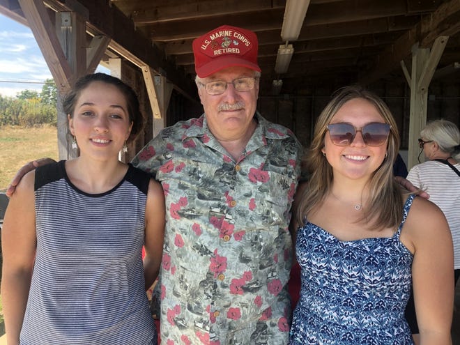 Mary Lombardi (left) and Katelyn Russell (right) were presented $500 scholarships by Commandant, Geoff Corson, at the Seacoast  Marine’s Detachment’s  picnic on Aug. 20, 2022.
