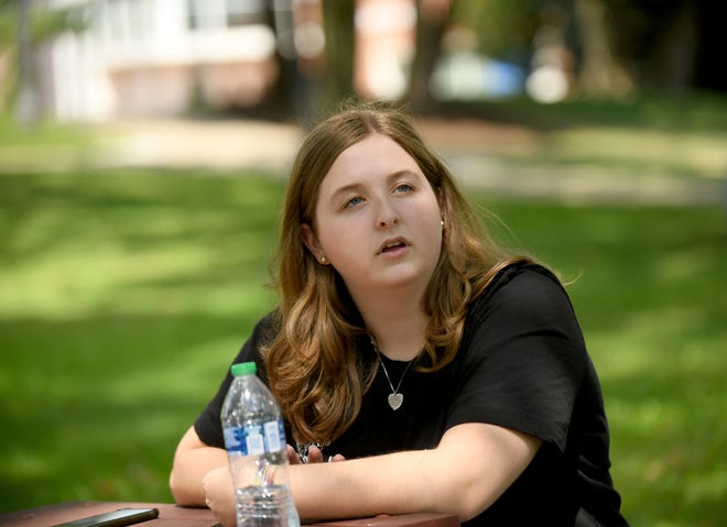 Student Amber Lanctot talks about President Joe Biden's plan to forgive at least $10,000 in federal student loan debt between her classes at Kent State University's Stark campus.