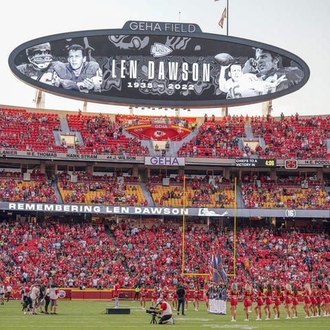 A tribute to the late Len Dawson is displayed befo