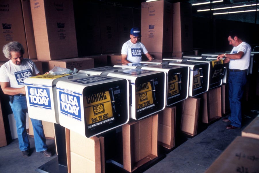 Coin racks are readied for distribution prior to the first issue dated Sept. 15, 1982.