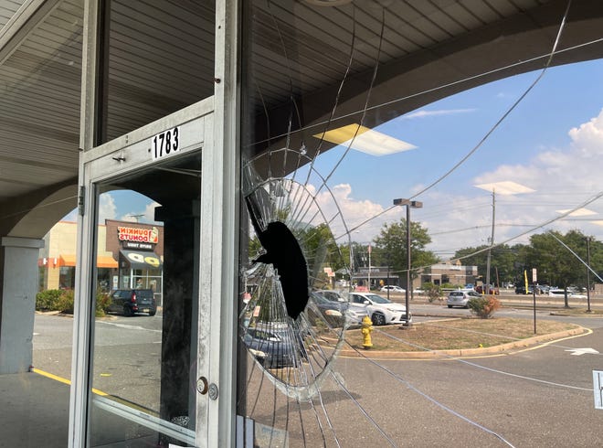 The front window at the Top Tier Hookah lounge in Toms River was seen shattered on Saturday, Aug. 27. Toms River Police and the Ocean County Prosecutor's Office are investigating the shooting of three people, including one fatally.