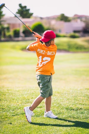 Marcello Perez, 8, "hitting the ball!"