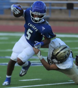 Lake View High School running back Ricky Ramirez tries to elude a Lamesa tackler during the season opener at San Angelo Stadium on Friday, Aug. 26, 2022.