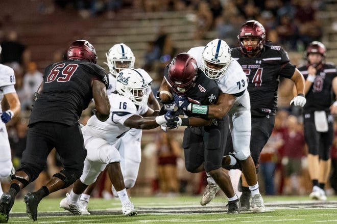 NMSU running back Star Thomas runs the ball during the New Mexico State University game on Saturday, Aug. 27, 2022, at the Aggie Memorial Stadium. 
