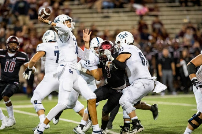 Nevada quarterback Nate Cox the ball during the New Mexico State University game on Saturday, Aug. 27, 2022, at the Aggie Memorial Stadium. 