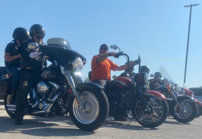 Local riders and supporters of Ride to Live veteran suicide prevention idle their motorcycles Saturday at American Legion Post 639.
