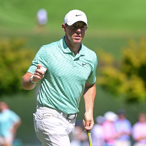 Rory McIlroy waves to the gallery during the final