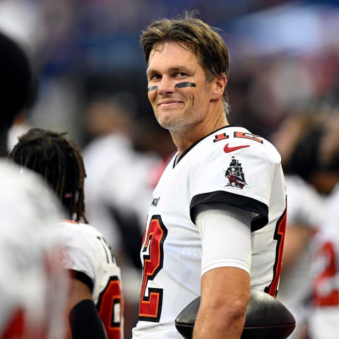 Tom Brady smiles during the national anthem before