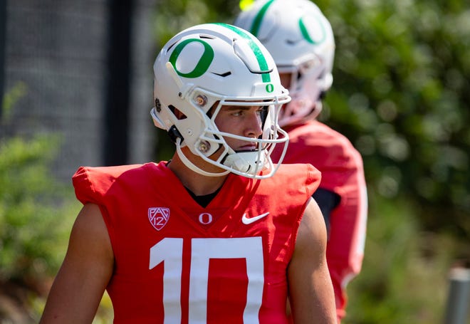 Oregon quarterback Bo Nix works out during practice on Aug. 19, 2022, in Eugene, Ore.